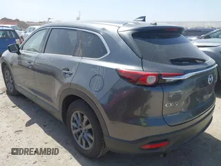 2021 Mazda CX-9 Touring with VIN JM3TCACY2M0502016, listed as a IAAI auction lot 41825456 with 86,068 mi miles and . Bid and sale history available at carsss.com. Image 3.