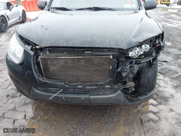 2012 Hyundai Santa Fe GLS with VIN 5XYZG3ABXCG159336, listed as a IAAI auction lot 41635699 with 128,975 mi miles. Bid and sale history available at carsss.com. Image 12.