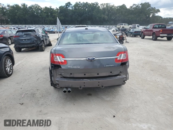2011 Ford Taurus Limited with VIN 1FAHP2FW3BG184887, listed as a Copart auction lot 60717875 with 196,102 mi miles and Salvage title. Bid and sale history available at DreamBid. Image 6.