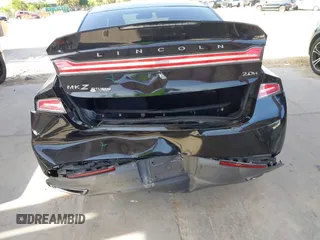 2014 Lincoln MKZ Hybrid z VIN 3LN6L2LU5ER831041, wystawiony jako IAAI lot #42447895 z przebiegiem 92 102 mil mil oraz . Historia ofert i sprzedaży dostępna na DreamBid. Obrazek 6.