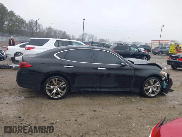 2015 Infiniti Q70 with VIN JN1BY1AR9FM561113, listed as a IAAI auction lot 41541936 with 266,227 mi miles and . Bid and sale history available at DreamBid. Image 13.