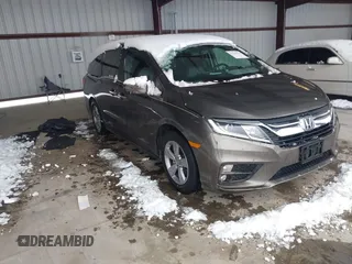 2019 Honda Odyssey EX-L with VIN 5FNRL6H74KB110637, listed as a IAAI auction lot 41538914 with 80,601 mi miles. Bid and sale history available at carsss.com. Image 1.
