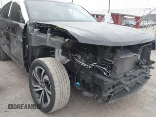 2022 Volkswagen Atlas SEL with VIN 1V2BE2CA2NC218844, listed as a IAAI auction lot 41264502 with 47,150 mi miles and . Bid and sale history available at DreamBid. Image 6.
