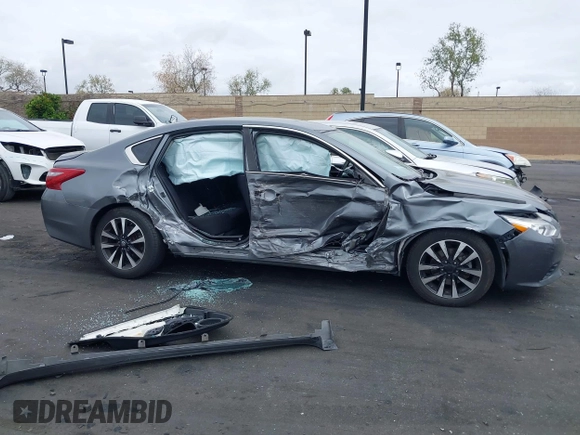 2018 Nissan Altima SV with VIN 1N4AL3AP3JC255885, listed as a IAAI auction lot 42033198 with 134,998 mi miles and . Bid and sale history available at DreamBid. Image 14.