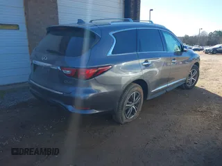 2016 Infiniti QX60 with VIN 5N1AL0MM6GC522175, listed as a IAAI auction lot 41427647 with 74,546 mi miles and . Bid and sale history available at DreamBid. Image 4.