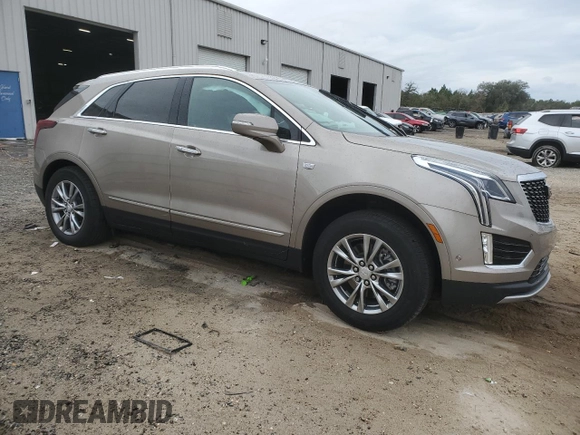 2022 Cadillac XT5 FWD Premium Luxury with VIN 1GYKNCRS1NZ117079, listed as a Copart auction lot 41448805 with 17,552 mi miles and Salvage title. Bid and sale history available at DreamBid. Image 4.