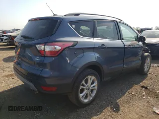 2018 Ford Escape SE z VIN 1FMCU9GD3JUA98865, wystawiony jako Copart lot #56842065 z przebiegiem 112 439 mil mil oraz Szkoda całkowita • Salvage title. Historia ofert i sprzedaży dostępna na DreamBid. Obrazek 3.