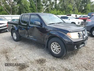 2014 Nissan Frontier SV with VIN 1N6AD0ER2EN723114, listed as a Copart auction lot 62919075 with 139,537 mi miles and Salvage title. Bid and sale history available at DreamBid. Image 4.