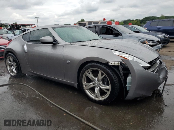 2009 Nissan 370Z Touring with VIN JN1AZ44E69M404789, listed as a Copart auction lot 62015094 with 56,447 mi miles and Salvage Title. Bid and sale history available at carsss.com. Image 4.