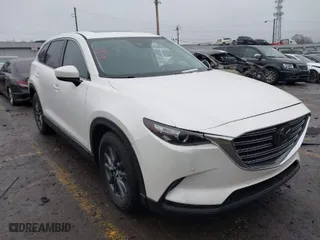 2021 Mazda CX-9 Touring with VIN JM3TCACY7M0525016, listed as a IAAI auction lot 41440800 with 22,934 mi miles. Bid and sale history available at carsss.com. Image 1.