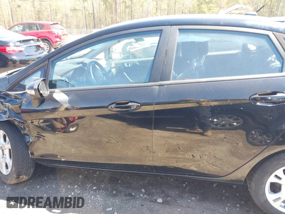 2016 Ford Fiesta SE with VIN 3FADP4BJ9GM144119, listed as a IAAI auction lot 41882179 with 122,048 mi miles. Bid and sale history available at carsss.com. Image 14.