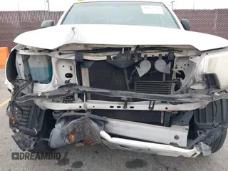 2014 Toyota Tacoma PreRunner z VIN 3TMJU4GN3EM170360, wystawiony jako IAAI lot #42438394 z przebiegiem 223 101 mil mil oraz . Historia ofert i sprzedaży dostępna na DreamBid. Obrazek 6.