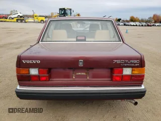 1989 Volvo 760 z VIN YV1GX8740K0076610, wystawiony jako Copart lot #77817564 z przebiegiem 199 672 mil mil oraz Szkody całkowita. Historia ofert i sprzedaży dostępna na DreamBid. Obrazek 6.