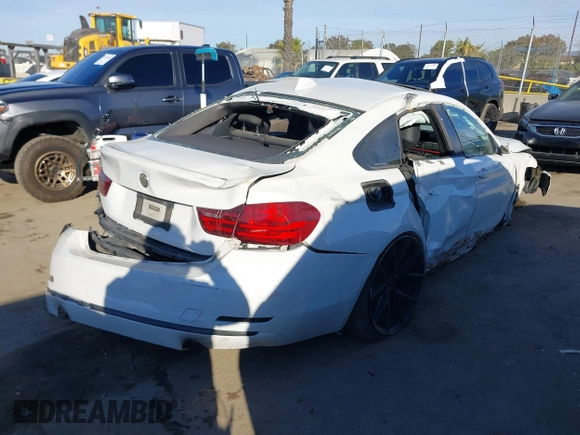 2015 BMW 4 Series 435i with VIN WBA4B1C54FD954791, listed as a IAAI auction lot 41590919 with 133,439 mi miles and . Bid and sale history available at carsss.com. Image 4.