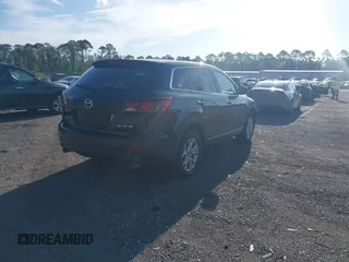 2014 Mazda CX-9 Touring with VIN JM3TB2CA1E0434126, listed as a IAAI auction lot 42639539 with 116,247 mi miles and . Bid and sale history available at DreamBid. Image 4.