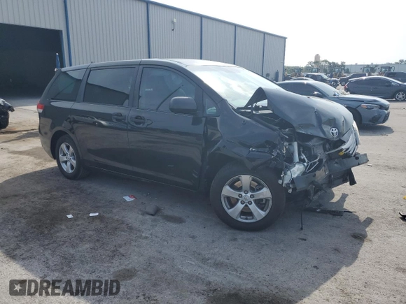 2014 Toyota Sienna L with VIN 5TDZK3DC8ES504985, listed as a Copart auction lot 56174035 with 185,955 mi miles and Salvage title. Bid and sale history available at DreamBid. Image 4.