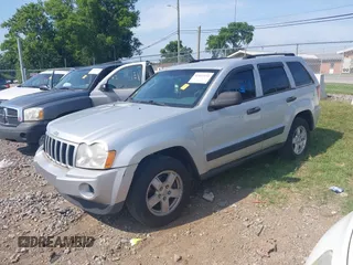 2006 Jeep Grand Cherokee Laredo with VIN 1J4GS48K56C260532, listed as a IAAI auction lot 42607110 with 153,110 mi miles and . Bid and sale history available at DreamBid. Image 2.