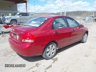 2009 Kia Spectra EX with VIN KNAFE221495665378, listed as a IAAI auction lot 42036945 with 153,254 mi miles. Bid and sale history available at carsss.com. Image 4.