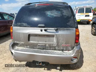 2005 GMC Envoy SLT z VIN 1GKDS13S652344365, wystawiony jako Copart lot #52745125 z przebiegiem 131 099 mil mil oraz Szkoda całkowita • Salvage title. Historia ofert i sprzedaży dostępna na DreamBid. Obrazek 6.