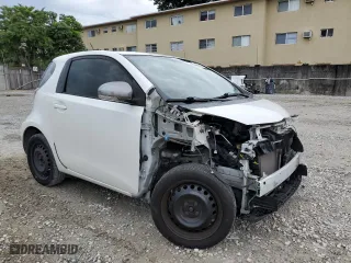 2014 Scion iQ with VIN JTNJJXB07EJ027099, listed as a Copart auction lot 46042385 with 84,316 mi miles and Salvage Title. Bid and sale history available at carsss.com. Image 4.