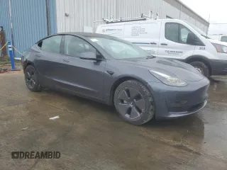 2023 Tesla Model 3 z VIN 5YJ3E1EA9PF699744, wystawiony jako Copart lot #56407215 z przebiegiem 5 201 mil mil oraz Szkoda całkowita • Salvage title. Historia ofert i sprzedaży dostępna na DreamBid. Obrazek 4.