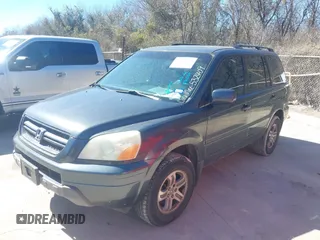 2004 Honda Pilot EX with VIN 2HKYF18574H532409, listed as a IAAI auction lot 41701760 with 302,949 mi miles and . Bid and sale history available at carsss.com. Image 2.