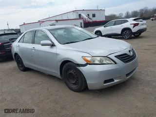 2007 Toyota Camry CE with VIN JTNBE46K773032670, listed as a IAAI auction lot 41920407 with 261,359 mi miles. Bid and sale history available at carsss.com. Image 1.