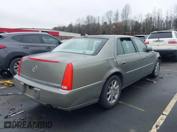 2010 Cadillac DTS 1SC z VIN 1G6KD5EY3AU134362, wystawiony jako IAAI lot #41579786 z przebiegiem 131 969 mil mil oraz . Historia ofert i sprzedaży dostępna na DreamBid. Obrazek 4.