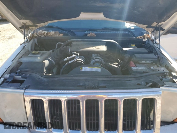 2010 Jeep Commander Sport with VIN 1J4RH4GK9AC113888, listed as a Copart auction lot 84553544 with 208,109 mi miles and Salvage title. Bid and sale history available at DreamBid. Image 12.