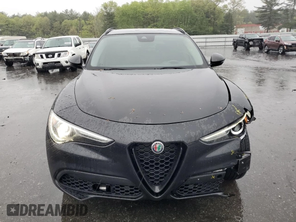 2020 Alfa Romeo Stelvio Ti z VIN ZASPAKBN9L7C94128, wystawiony jako Copart lot #56129775 z przebiegiem 54 042 mil mil oraz Szkody całkowita. Historia ofert i sprzedaży dostępna na DreamBid. Obrazek 5.