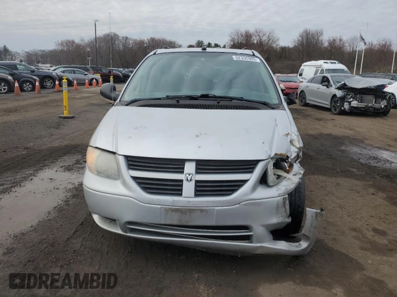 2005 Dodge Caravan with VIN 1D4GP24R95B421664, listed as a Copart auction lot 52335905 with 125,338 mi miles and Salvage Title. Bid and sale history available at carsss.com. Image 5.