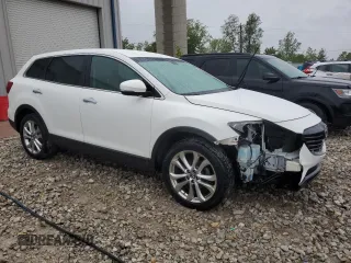 2013 Mazda CX-9 Grand Touring z VIN JM3TB3DV3D0412229, wystawiony jako Copart lot #57334325 z przebiegiem 146 976 mil mil oraz Czysty tytuł • Clean title. Historia ofert i sprzedaży dostępna na DreamBid. Obrazek 4.