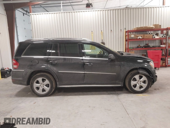 2011 Mercedes-Benz GL-Class GL 450 with VIN 4JGBF7BE2BA737203, listed as a IAAI auction lot 41364607 with 133,921 mi miles. Bid and sale history available at carsss.com. Image 14.
