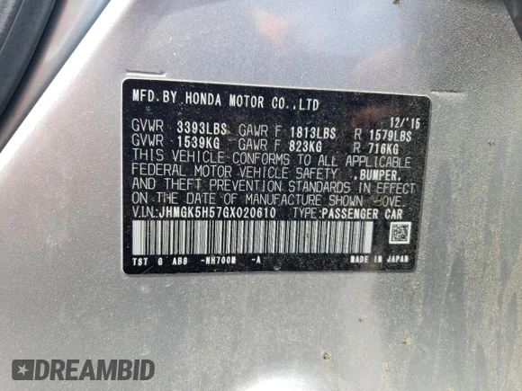 2016 Honda Fit LX z VIN JHMGK5H57GX020610, wystawiony jako Copart lot #61012305 z przebiegiem 99 001 mil mil oraz Szkoda całkowita • Salvage title. Historia ofert i sprzedaży dostępna na DreamBid. Obrazek 13.
