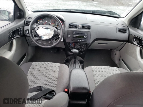 2007 Ford Focus S z VIN 1FAHP34N07W177912, wystawiony jako Copart lot #60481025 z przebiegiem 114 086 mil mil oraz Szkoda całkowita • Salvage title. Historia ofert i sprzedaży dostępna na DreamBid. Obrazek 8.