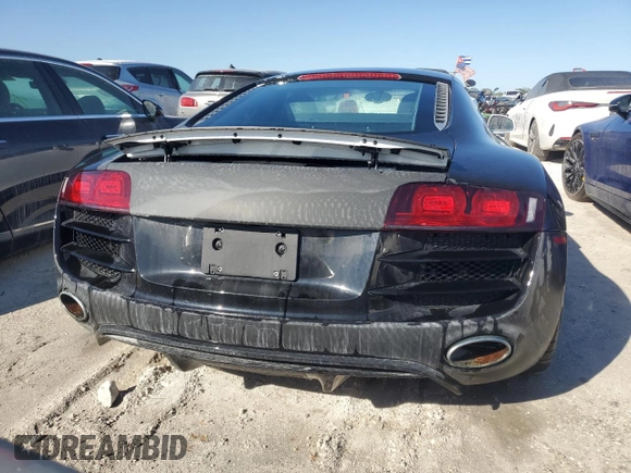2011 Audi R8 5.2L z VIN WUAANAFG8BN000143, wystawiony jako Copart lot #74799504 z przebiegiem Nie podano mil oraz Szkoda całkowita • Salvage title. Historia ofert i sprzedaży dostępna na DreamBid. Obrazek 6.
