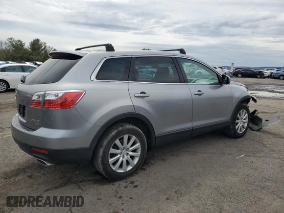 2010 Mazda CX-9 Grand Touring z VIN JM3TB3MV5A0210214, wystawiony jako Copart lot #51251585 z przebiegiem 138 885 mil mil oraz Szkoda całkowita • Salvage title. Historia ofert i sprzedaży dostępna na DreamBid. Obrazek 3.