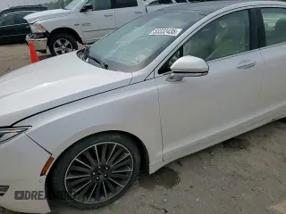 2014 Lincoln MKZ z VIN 3LN6L2GK9ER825882, wystawiony jako Copart lot #53332435 z przebiegiem 114 677 mil mil oraz Szkoda całkowita • Salvage title. Historia ofert i sprzedaży dostępna na DreamBid. Obrazek 14.