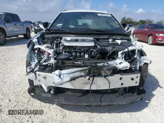 2019 Lexus UX with VIN JTHY3JBH7K2002188, listed as a Copart auction lot 40883883 with 34,736 mi miles. Bid and sale history available at carsss.com. Image 5.