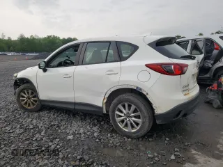 2016 Mazda CX-5 Sport с VIN JM3KE4BY4G0899953, выставлен на аукционе Copart как лот 57269035 с пробегом 196 158 миль миль и Списание • Salvage title. История ставок и продаж доступна на DreamBid. Изображение 2.