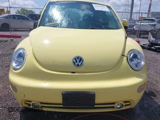 2000 Volkswagen Beetle GLS z VIN 3VWCA21C4YM414855, wystawiony jako IAAI lot #42198615 z przebiegiem 128 131 mil mil oraz . Historia ofert i sprzedaży dostępna na DreamBid. Obrazek 13.
