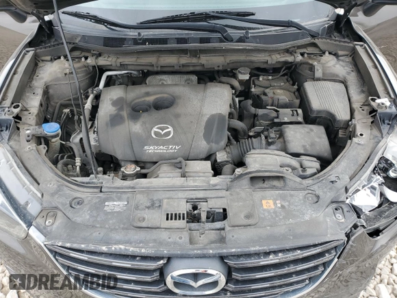 2016 Mazda CX-5 Touring with VIN JM3KE2CY8G0902131, listed as a Copart auction lot 53354745 with 123,474 mi miles and Salvage Title. Bid and sale history available at carsss.com. Image 12.