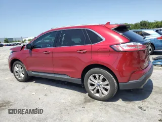 2019 Ford Edge Titanium z VIN 2FMPK3K91KBB99949, wystawiony jako Copart lot #57023225 z przebiegiem 103 876 mil mil oraz Nie do naprawy. Historia ofert i sprzedaży dostępna na DreamBid. Obrazek 2.