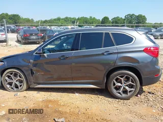 2016 BMW X1 xDrive28i with VIN WBXHT3C31G5E47828, listed as a IAAI auction lot 42592338 with 91,927 mi miles and . Bid and sale history available at DreamBid. Image 14.