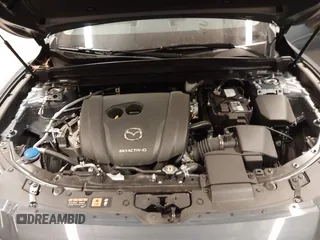 2024 Mazda CX-50 S Select with VIN 7MMVABAM8RN198360, listed as a IAAI auction lot 41206508 with 2,658 mi miles and . Bid and sale history available at DreamBid. Image 10.