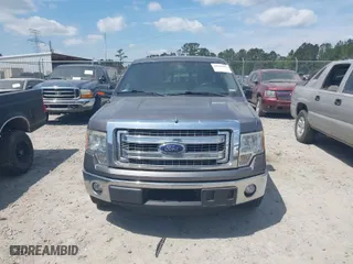 2013 Ford F-150 XL with VIN 1FTFW1CT3DKG38788, listed as a IAAI auction lot 42030091 with 158,213 mi miles. Bid and sale history available at carsss.com. Image 12.