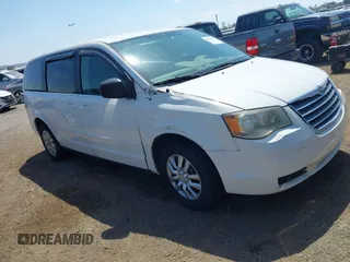 2009 Chrysler Town & Country LX with VIN 2A8HR44E79R549129, listed as a IAAI auction lot 42079369 with 102,805 mi miles. Bid and sale history available at carsss.com. Image 1.