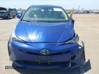 2017 Toyota Prius Two with VIN JTDKBRFUXH3044163, listed as a IAAI auction lot 42196278 with 117,610 mi miles and . Bid and sale history available at DreamBid. Image 12.