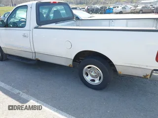 2002 Ford F-150 XL with VIN 1FTRF17W72NA67786, listed as a IAAI auction lot 41869585 with 180,262 mi miles. Bid and sale history available at carsss.com. Image 13.
