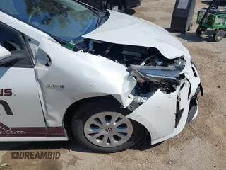 2021 Toyota Prius L Eco with VIN JTDKAMFU8M3133925, listed as a IAAI auction lot 41966660 with 115,193 mi miles. Bid and sale history available at carsss.com. Image 17.